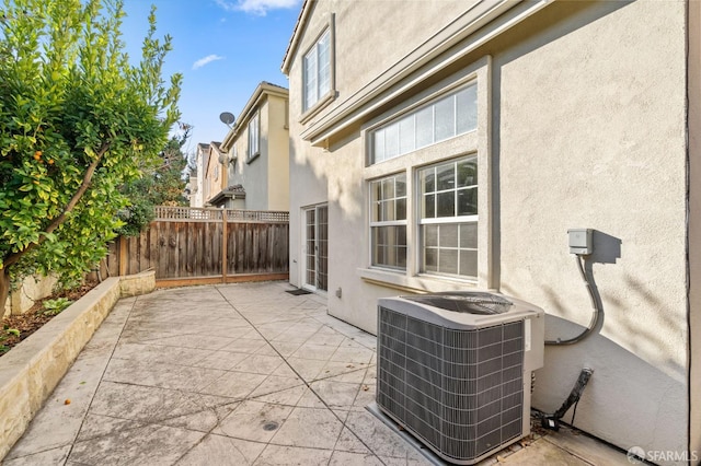 view of patio featuring central air condition unit