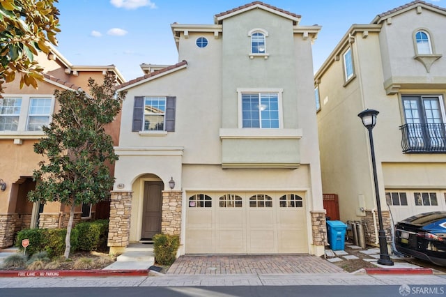 view of front of property featuring a garage