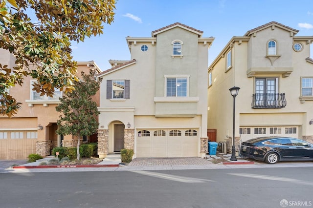 view of front of property with a garage