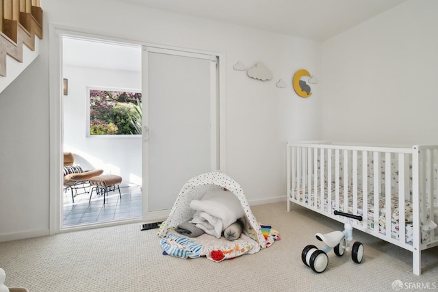 carpeted bedroom with visible vents