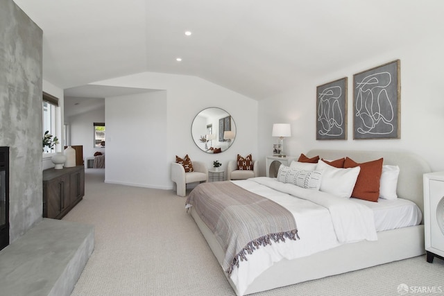 bedroom with lofted ceiling, recessed lighting, and light colored carpet