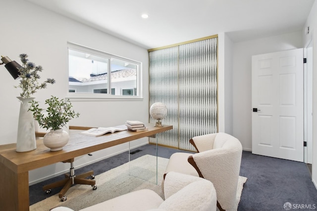 carpeted office with recessed lighting and baseboards