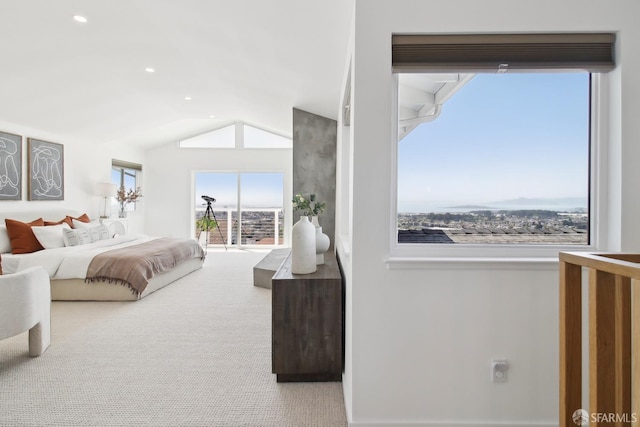 carpeted bedroom with vaulted ceiling and recessed lighting