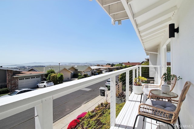 balcony featuring a mountain view