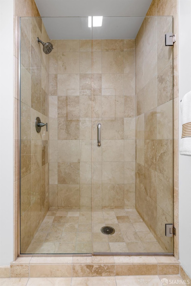 bathroom with a stall shower