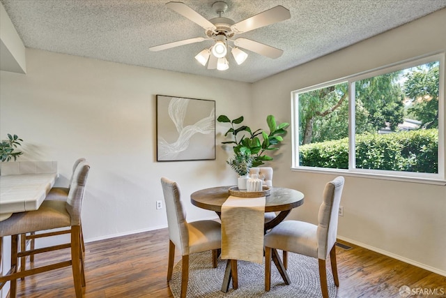 503 Camelback Rd, Pleasant Hill, CA 94523 - dining space featuring wood finished floors, a textured ceiling, ceiling fan, and baseboards