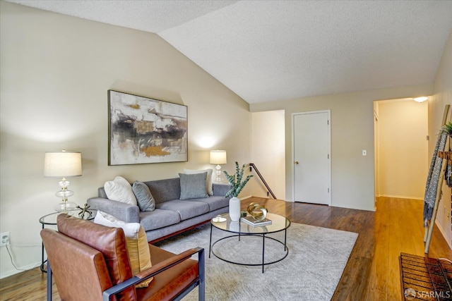 503 Camelback Rd, Pleasant Hill, CA 94523 - living area with wood finished floors, vaulted ceiling, and a textured ceiling