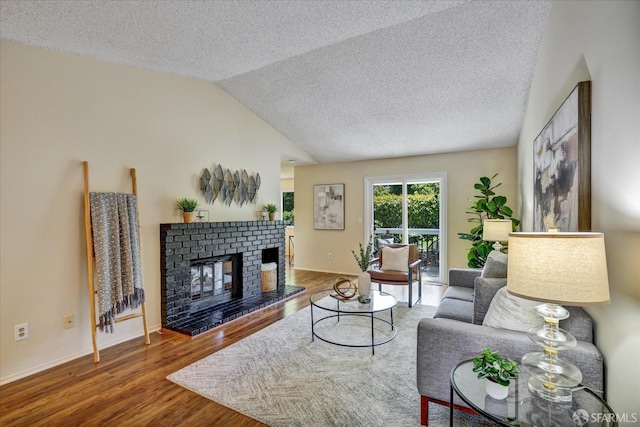 503 Camelback Rd, Pleasant Hill, CA 94523 - living room featuring wood finished floors, a fireplace, a textured ceiling, vaulted ceiling, and baseboards