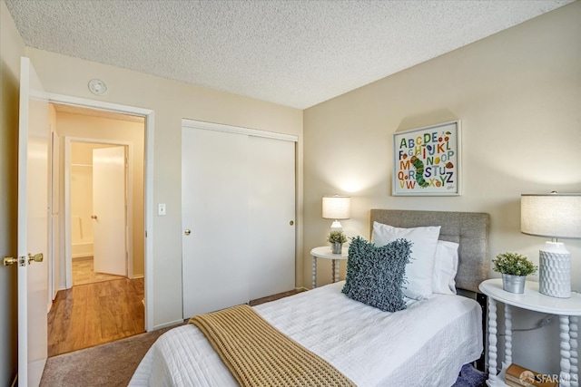 503 Camelback Rd, Pleasant Hill, CA 94523 - carpeted bedroom featuring a closet and a textured ceiling