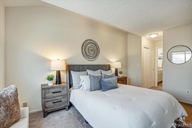 503 Camelback Rd, Pleasant Hill, CA 94523 - bedroom featuring light colored carpet, baseboards, ensuite bath, and a textured ceiling