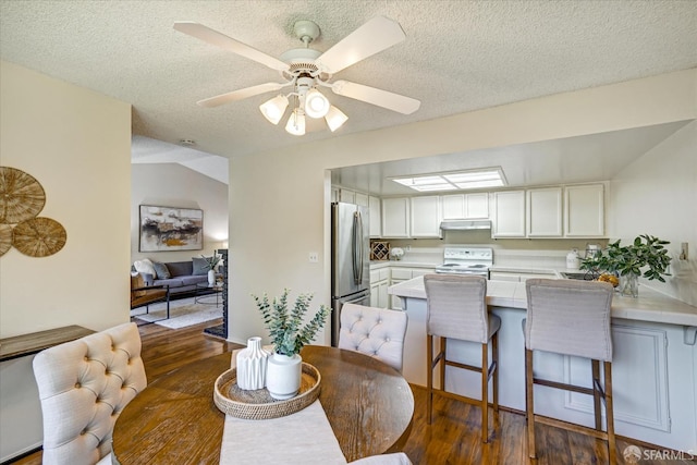 503 Camelback Rd, Pleasant Hill, CA 94523 - dining room featuring dark wood-style flooring, a textured ceiling, and ceiling fan