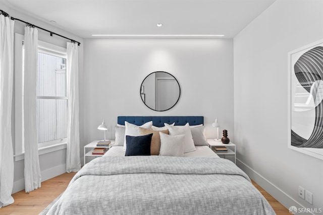 38 Steiner St Unit 303, San Francisco, CA 94114 - bedroom featuring wood finished floors and baseboards