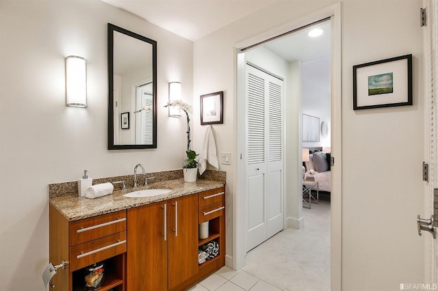 bathroom with vanity and tile patterned floors