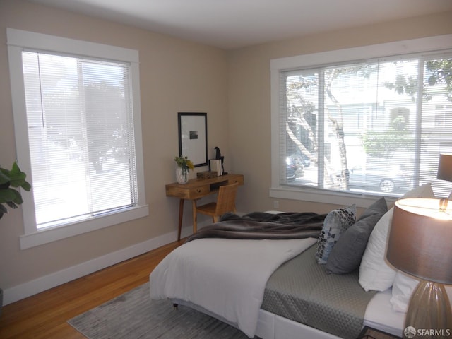 700 12th Ave Unit 2, San Francisco, CA 94118 - bedroom with wood finished floors and baseboards