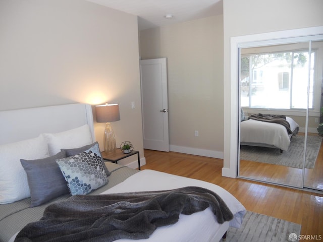 700 12th Ave Unit 2, San Francisco, CA 94118 - bedroom with wood finished floors and a closet