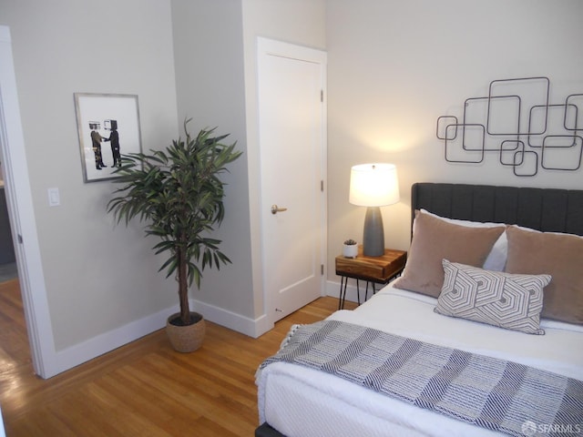 700 12th Ave Unit 2, San Francisco, CA 94118 - bedroom with wood finished floors and baseboards