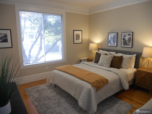 700 12th Ave Unit 2, San Francisco, CA 94118 - bedroom featuring wood finished floors and ornamental molding