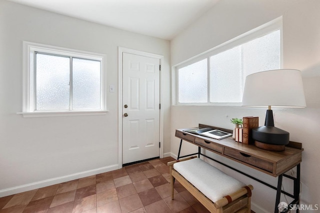 entrance foyer featuring baseboards