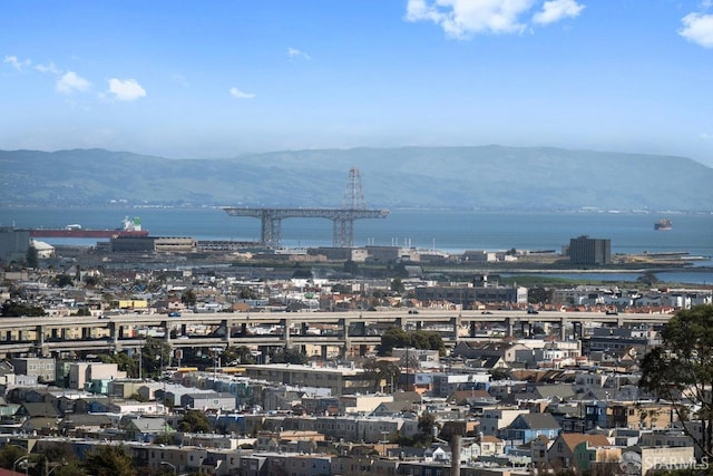 exterior space with a view of city and a mountain view