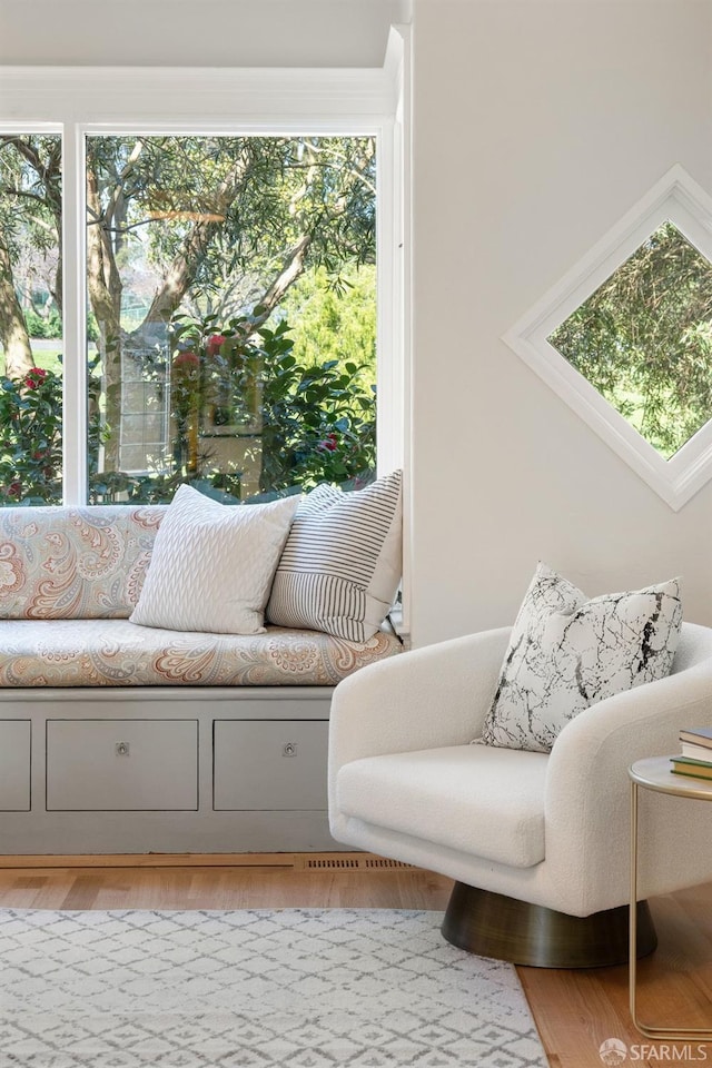 sitting room with light wood-style floors