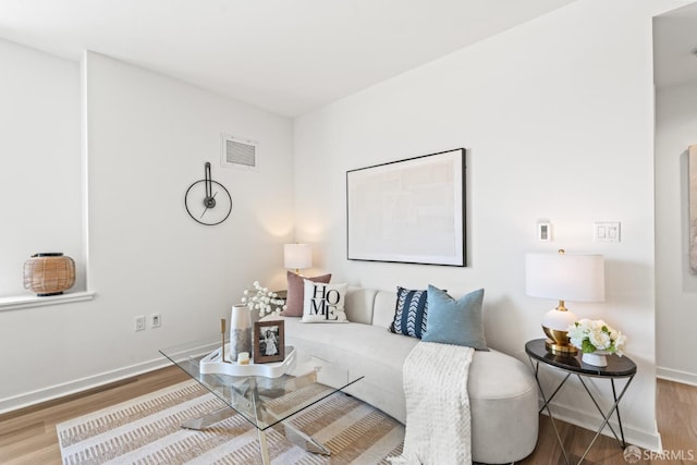 250 King St Unit 536, San Francisco, CA 94107 - living area featuring wood finished floors and baseboards