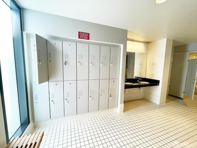 250 King St Unit 536, San Francisco, CA 94107 - bathroom featuring tile patterned floors, vanity, and mail area