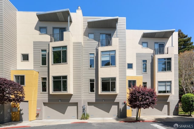 1829 15th St Unit 1, San Francisco, CA 94103 - view of building exterior with an attached garage