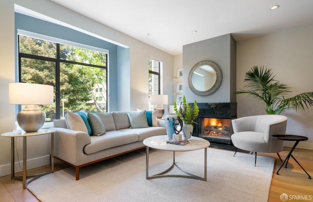 1829 15th St Unit 1, San Francisco, CA 94103 - living area with recessed lighting, light wood-type flooring, and a multi sided fireplace