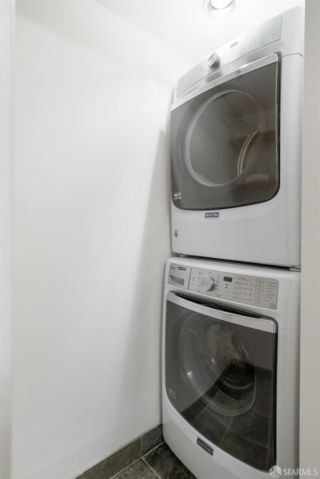 1829 15th St Unit 1, San Francisco, CA 94103 - laundry room featuring stacked washer / dryer and laundry area