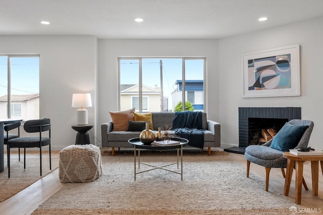 281 Polaris Way, Daly City, CA 94014 - living area featuring plenty of natural light, a brick fireplace, recessed lighting, and wood finished floors
