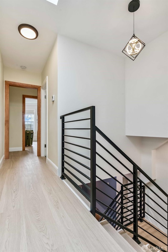 1210 40th Ave, San Francisco, CA 94122 - corridor featuring an upstairs landing and wood finished floors