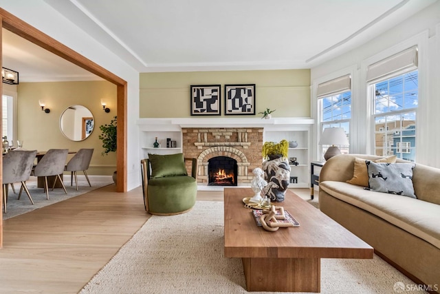 1210 40th Ave, San Francisco, CA 94122 - living area featuring light wood-style flooring, a fireplace, and built in features