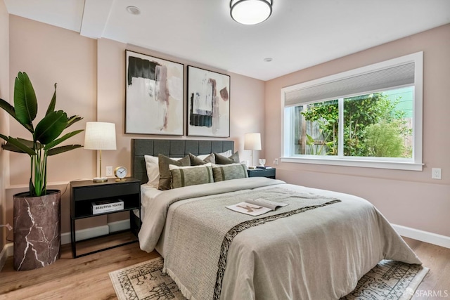 1210 40th Ave, San Francisco, CA 94122 - bedroom featuring wood finished floors and baseboards