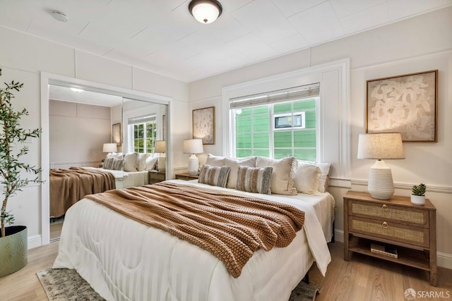 1210 40th Ave, San Francisco, CA 94122 - bedroom featuring wood finished floors and a closet