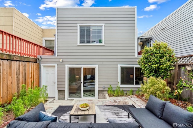 1210 40th Ave, San Francisco, CA 94122 - rear view of house with outdoor lounge area and a patio area