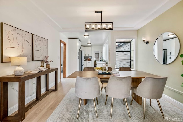 1210 40th Ave, San Francisco, CA 94122 - dining space with light wood-style floors and baseboards