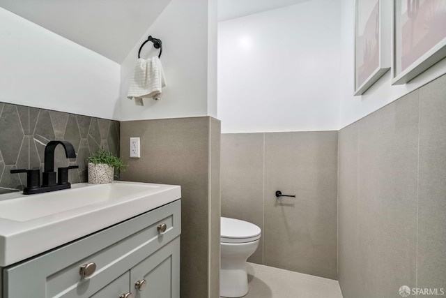 1210 40th Ave, San Francisco, CA 94122 - half bath featuring tile walls and vanity