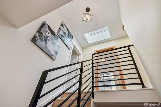 1210 40th Ave, San Francisco, CA 94122 - stairs featuring a skylight