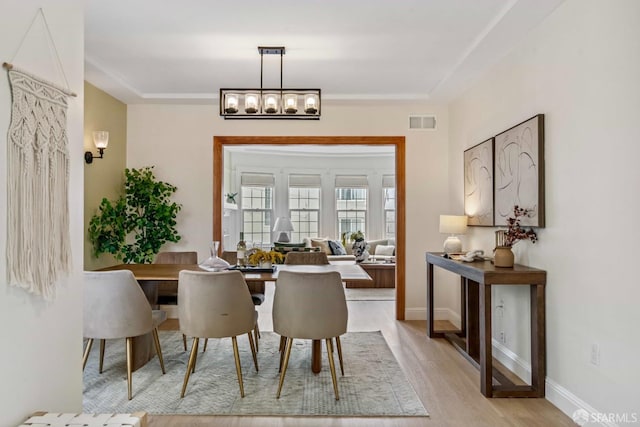1210 40th Ave, San Francisco, CA 94122 - dining space with light wood-style flooring and baseboards