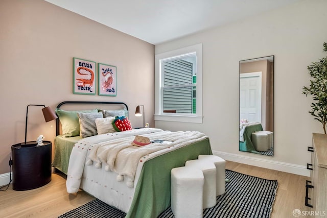1210 40th Ave, San Francisco, CA 94122 - bedroom featuring wood finished floors and baseboards