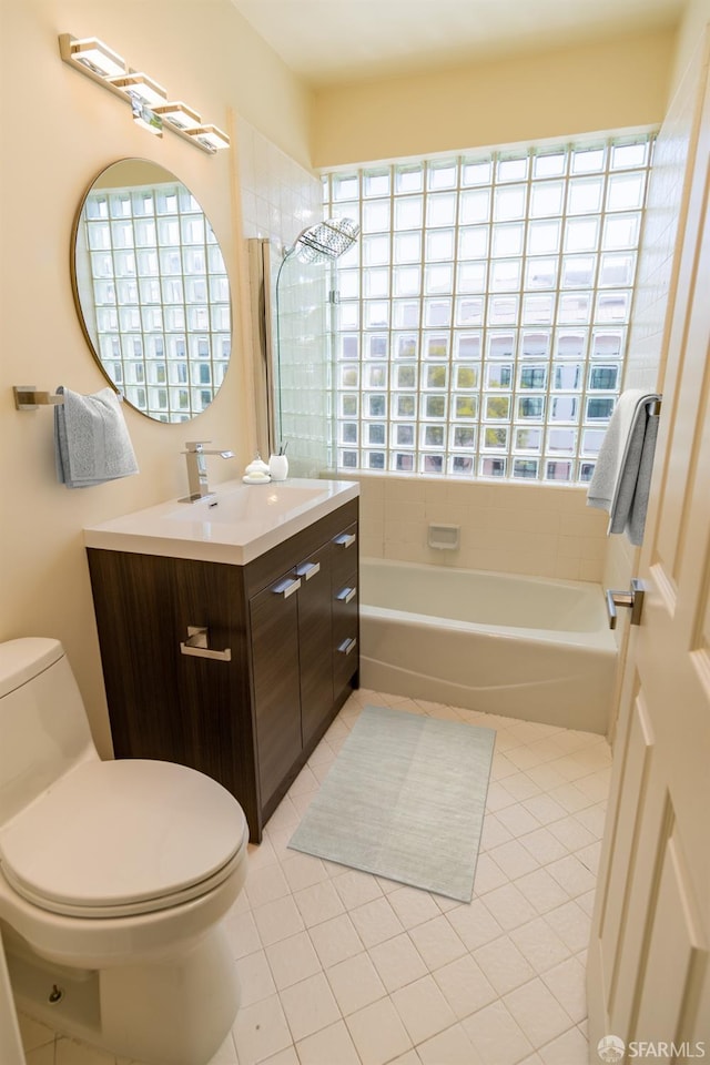 bathroom with tile patterned floors, toilet, and vanity