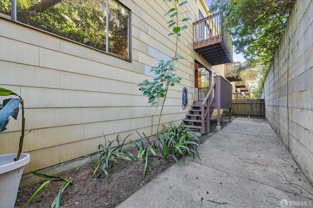 view of home's exterior featuring a balcony