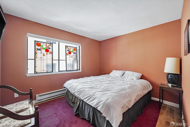 carpeted bedroom with baseboard heating