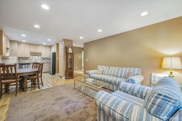 living room with light hardwood / wood-style flooring