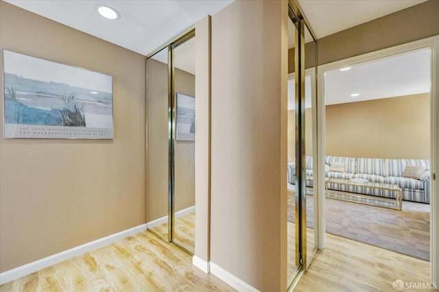 hallway featuring light hardwood / wood-style flooring