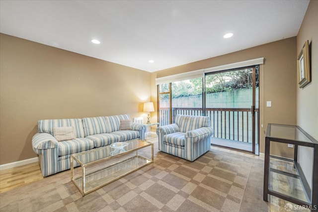 living room featuring light carpet