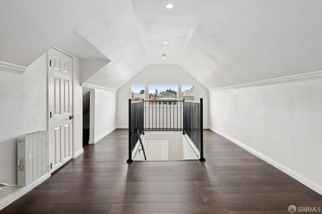 63-65 Jersey St, San Francisco, CA 94114 - additional living space with radiator, dark wood-style flooring, lofted ceiling, and recessed lighting
