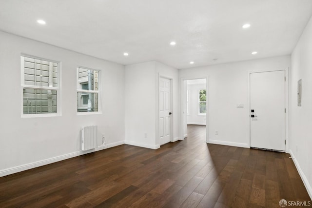 63-65 Jersey St, San Francisco, CA 94114 - entrance foyer featuring radiator heating unit, wood finished floors, and recessed lighting