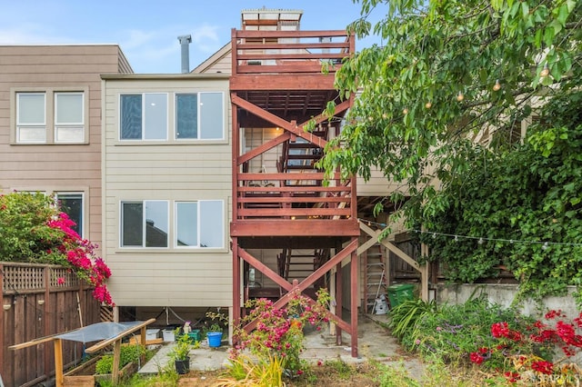 63-65 Jersey St, San Francisco, CA 94114 - rear view of house featuring stairway and a deck