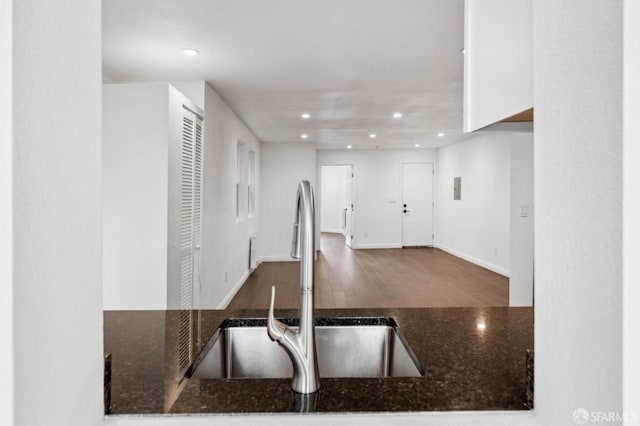 63-65 Jersey St, San Francisco, CA 94114 - kitchen with recessed lighting, dark stone countertops, and wood finished floors